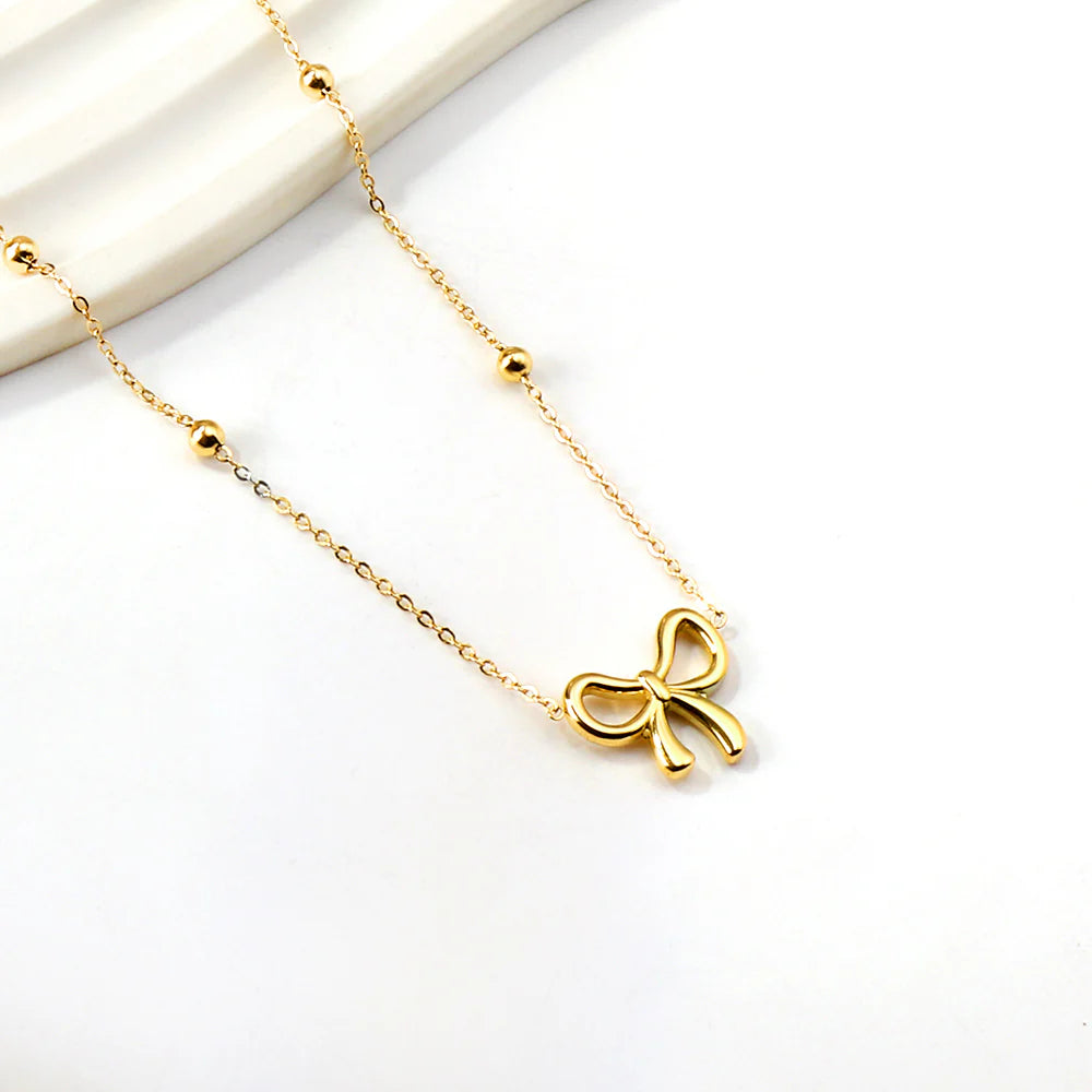VM | Goudkleurige Ketting met Strikhanger